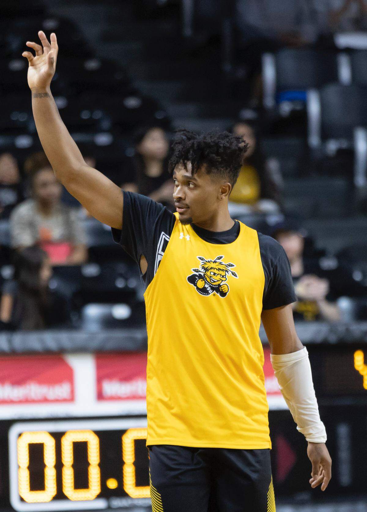 Tyson Etienne is welcomed back to Koch Arena with cheers from Wichita State fans at Shocker Madness on Tuesday.