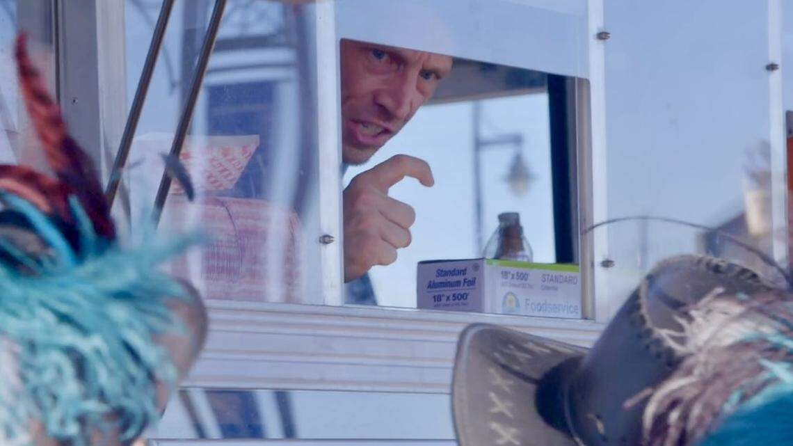 Chad Freeman, one of the owners of Argentina’s Empanadas from Wichita, informs pirates preparing to dine from his food truck that they’re about to eat a specialty of “Arr-gentina.” Freeman is one of three Wichitans appearing on Food Network’s “The Great Food Truck Race: Games on the Gulf.”