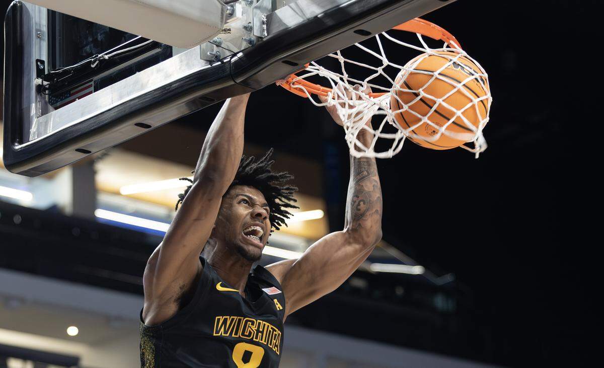 Wichita State Dillon Battie dunks the ball during the first half of their AAC tournament championship game against South Florida on Sunday in Birmingham.