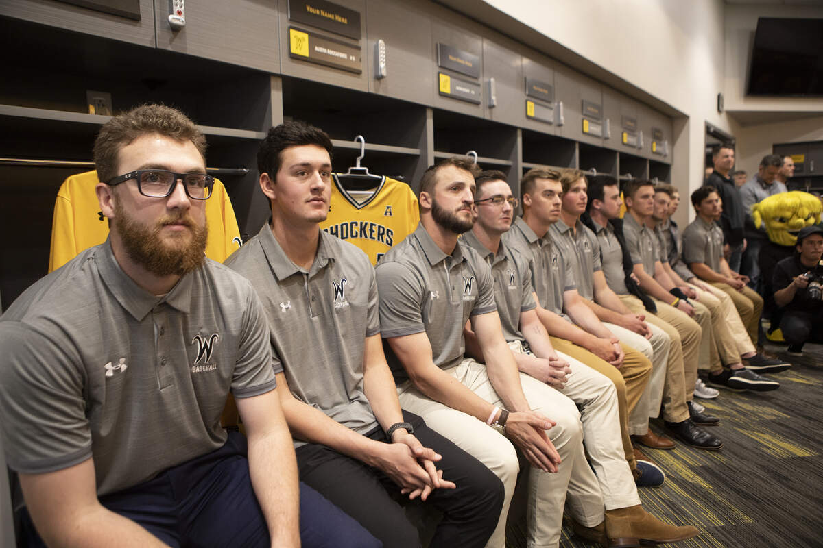 Wichita State University baseball players attend a ribbon cutting ceremony and open house inside the locker room of the new $3.5M baseball facility. The 10,000-square foot facility features a strength and conditioning center, two athletic training rooms, student-athlete locker room, coaches locker room, media room and a new Shocker dugout on the third base side.