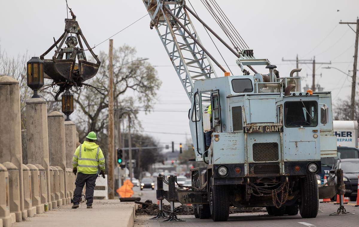 Two days after The Eagle’s front-page Sunday story about the desperate attention needed at the Minisa Bridge in Riverside, a large crew and a huge crane were at the bridge by North High School cleaning debris from its foundation.
