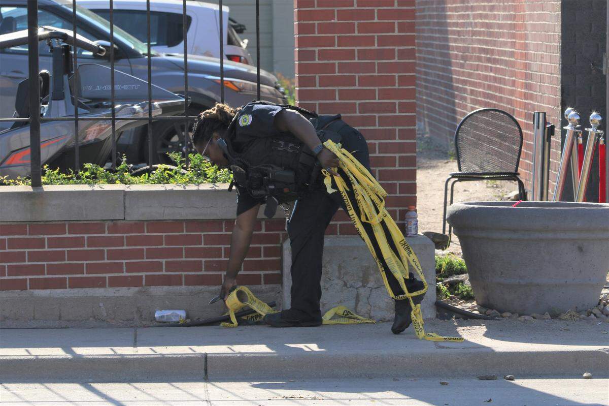Officers and crime scene investigators began clearing up and removing crime scene tape shortly before 9 a.m.