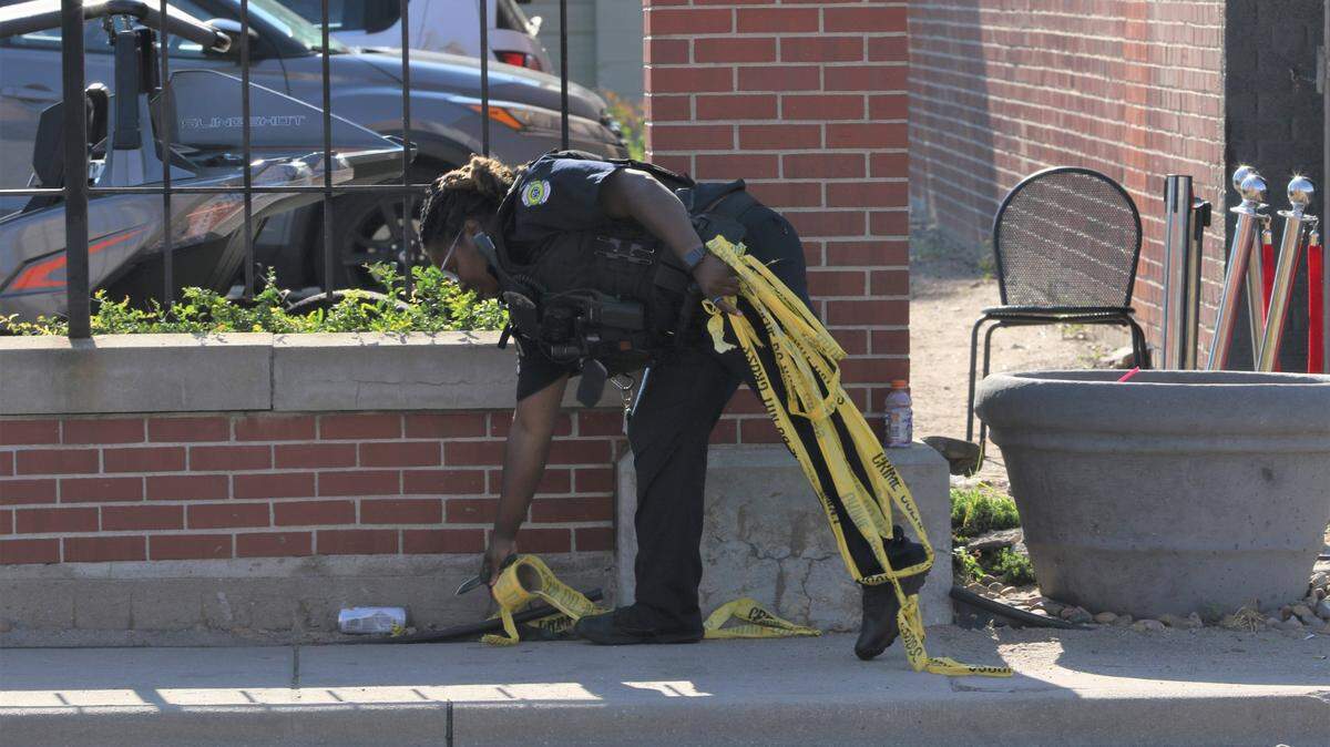 Officers and crime scene investigators began clearing up and removing crime scene tape shortly before 9 a.m. Sunday.