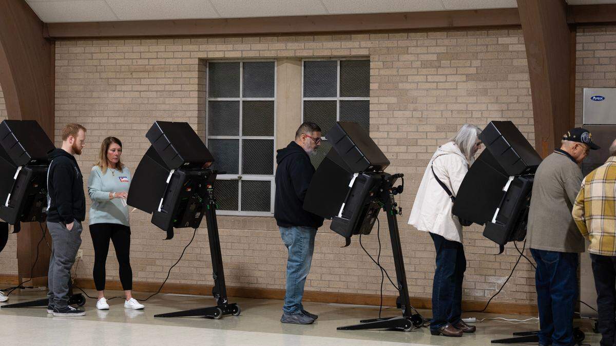 People vote at Woodland United Methodist Church on Election Day  in November 2024.