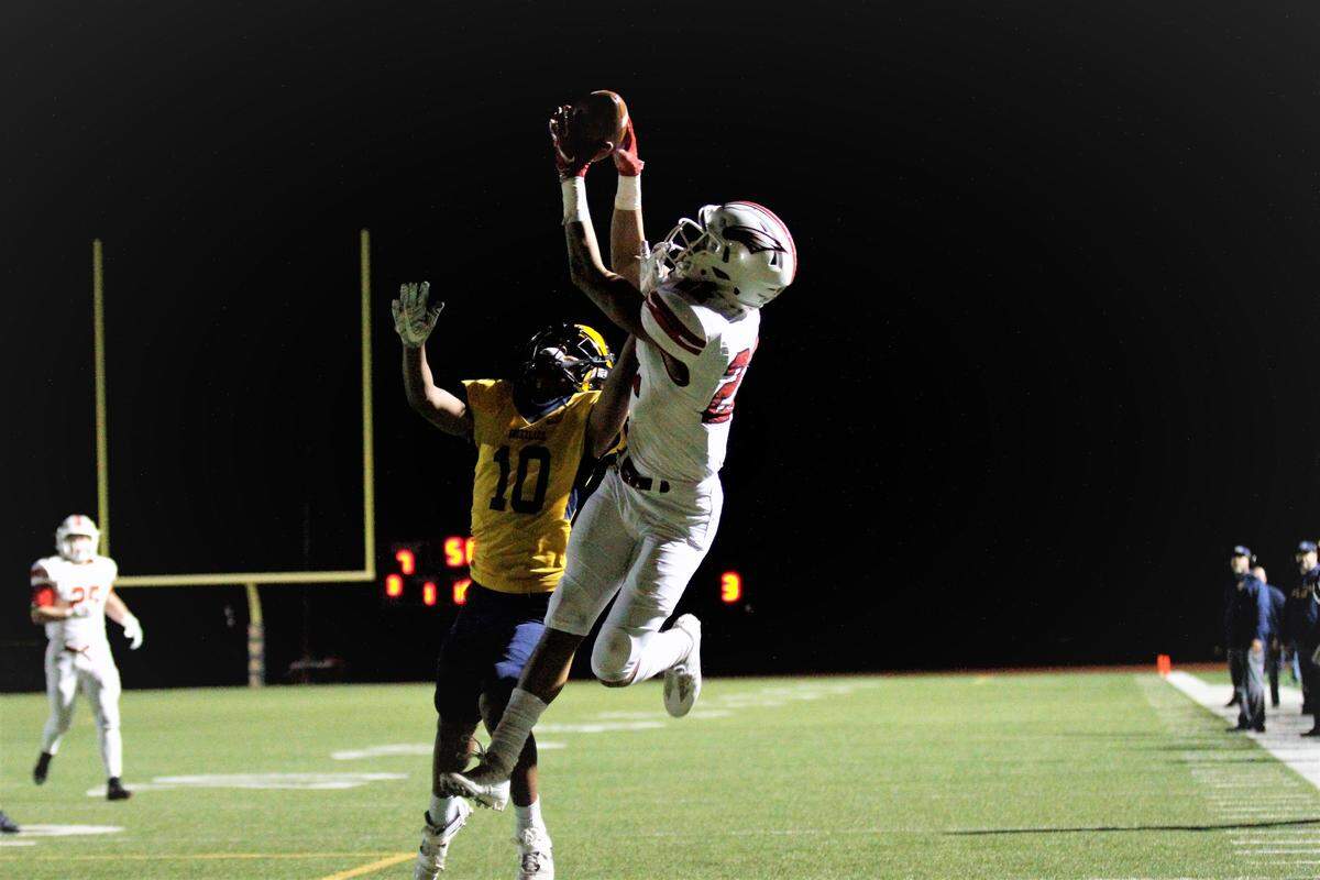 Maize junior receiver Preven Christon goes up for one of his three touchdown catches in the Eagles’ state semifinal game at Wichita Northwest on Friday. (Nov. 16, 2018)
