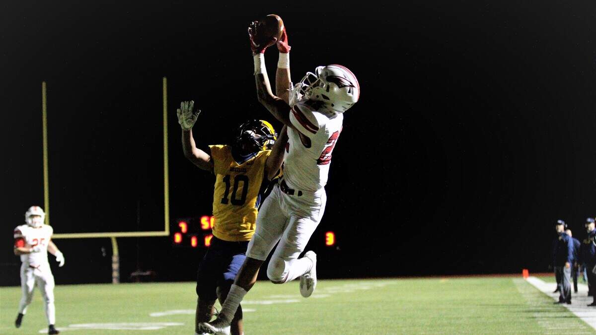 Maize junior receiver Preven Christon goes up for one of his three touchdown catches in the Eagles’ state semifinal game at Wichita Northwest on Friday. (Nov. 16, 2018)