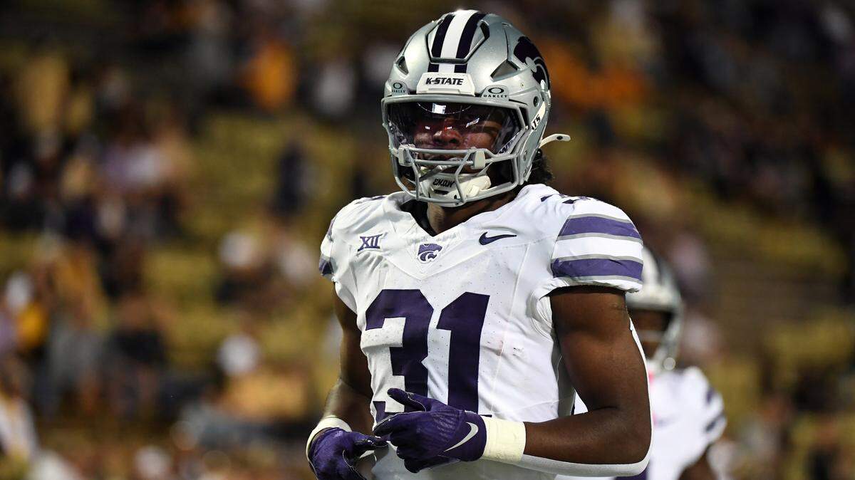 Kansas State Wildcats running back DJ Giddens warms up before last weekend’s game against the Colorado Buffaloes at Folsom Field in Boulder, Colo.