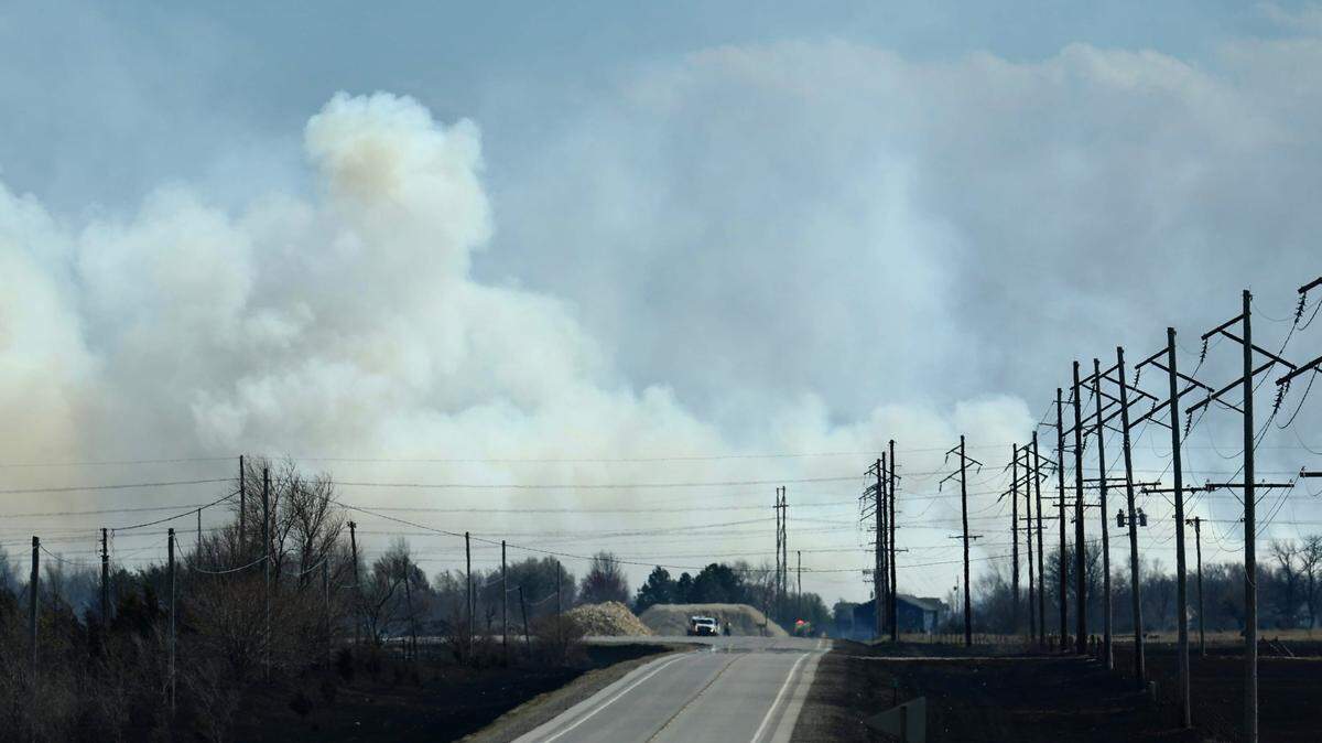 A fire burns near the intersection of K-254 and K-196.