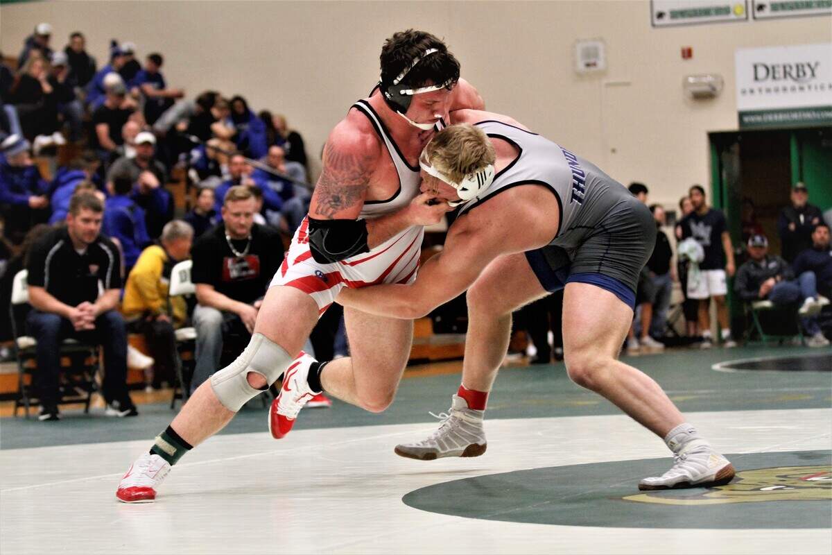 El Dorado’s Braden Morgan (left) wrestled against St. James Academy’s Cade Lautt at the Derby Invitational on Saturday night. (Jan. 5, 2019)