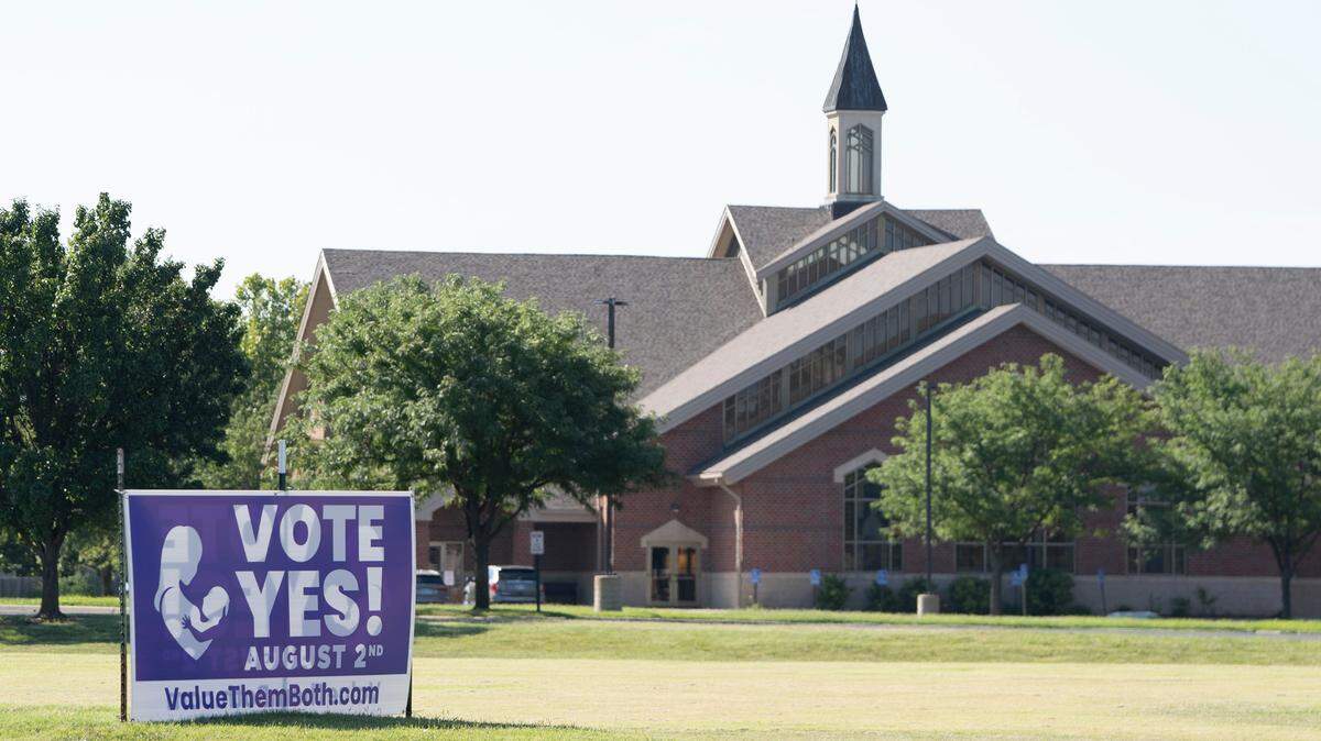 A Vote Yes sign at one of the two entrances to St. Elizabeth Ann Seton Catholic Church. The church is a polling place and signs are allowed if they are more than 250 feet from a polling place’s designated doorway.