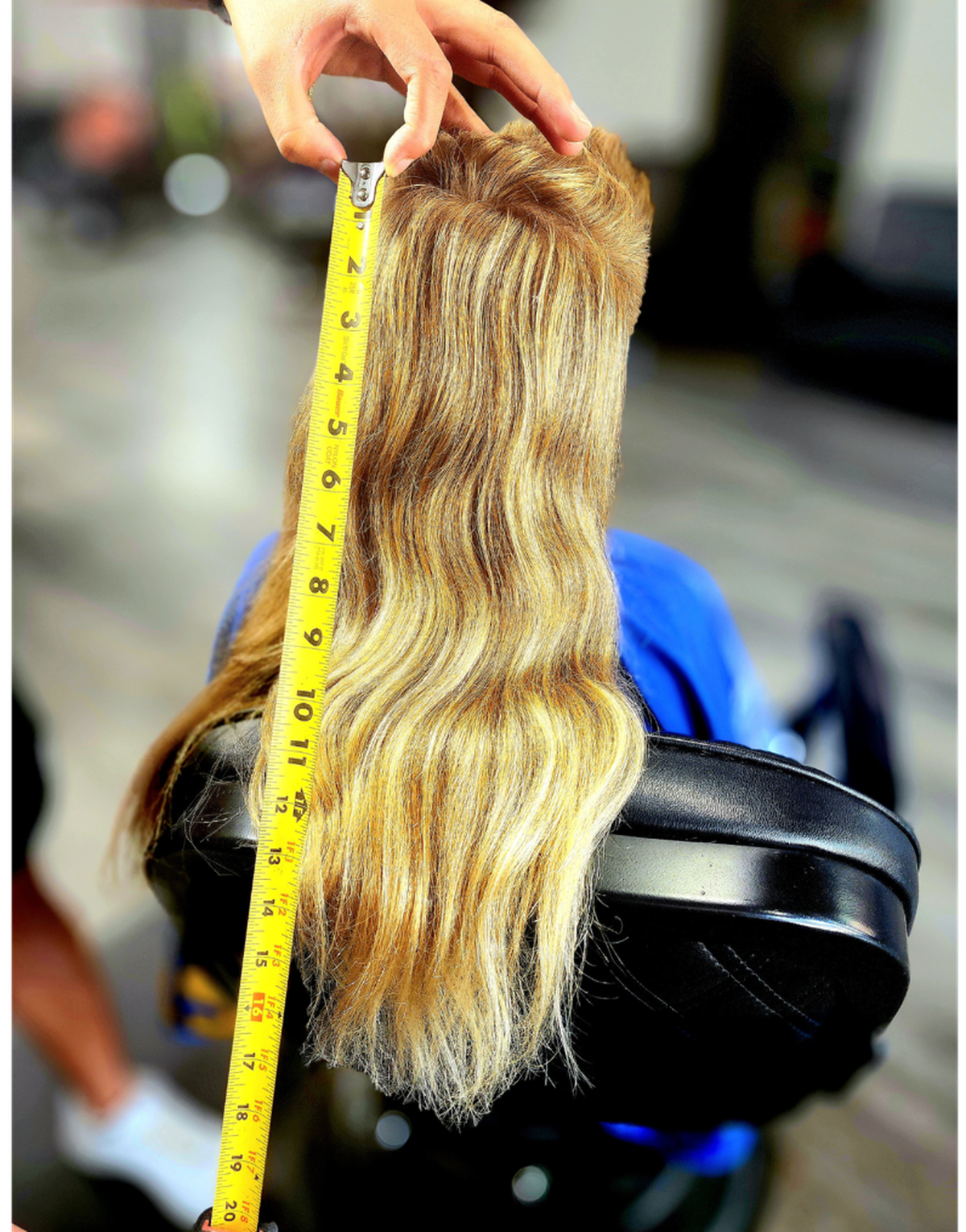 Augie Munoz, 7, has a mullet that stretches 20 inches down the back of his 55-inch frame.