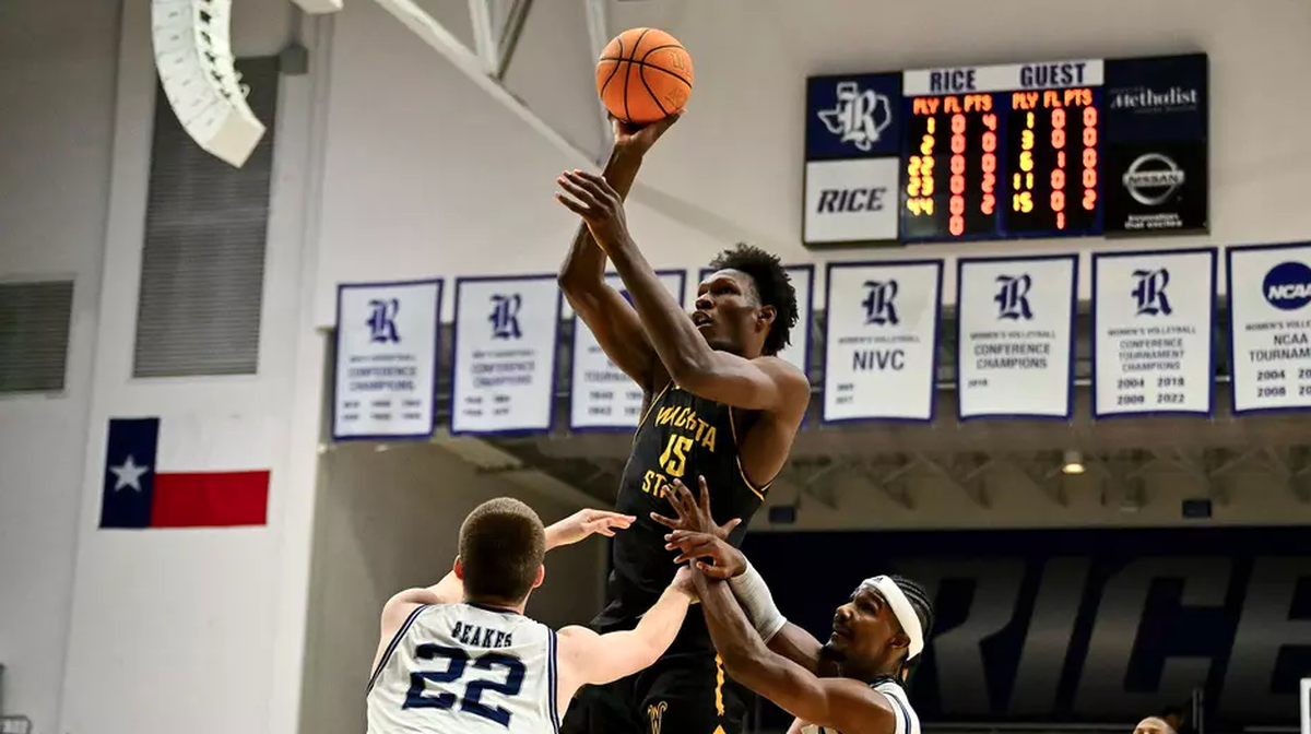 Wichita State center Quincy Ballard looks to score against Rice in Thursday’s game at Tudor Fieldhouse.