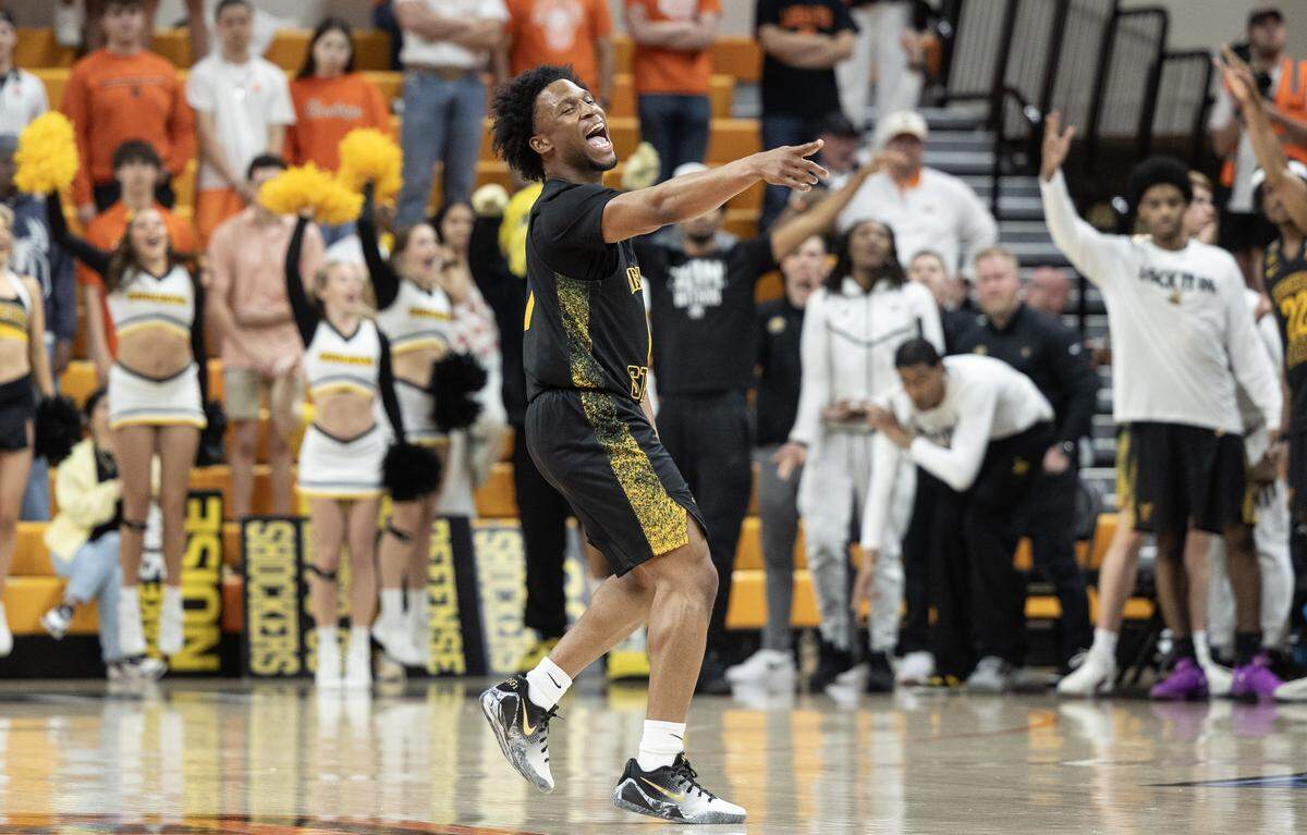 Wichita State’s Kenyon Giles celebrates a three pointer during the first half at Oklahoma State in the second round of the NIT tournament on Sunday.