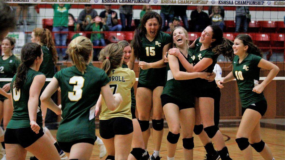 Bishop Carroll’s Riley Daugherty (second right) and Ella Larkin (third right) were chosen to the Class 5A All-Tournament volleyball team in 2018.