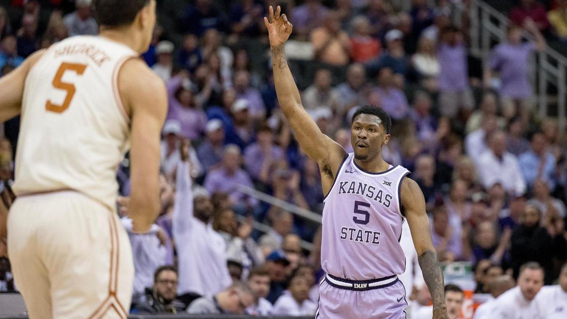 Kansas State Wildcats guard Cam Carter (5) celebrates a 3-pointer during a game against the Texas Longhorns in the Big 12 men’s basketball tournament on Wednesday, March 13, 2024, in Kansas City.