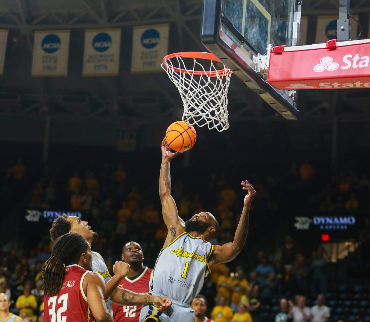 Small Forward Marcus McDuffie leaps for a basket during the AfterShocks’ game against Team Challenge ALS on Sunday night.