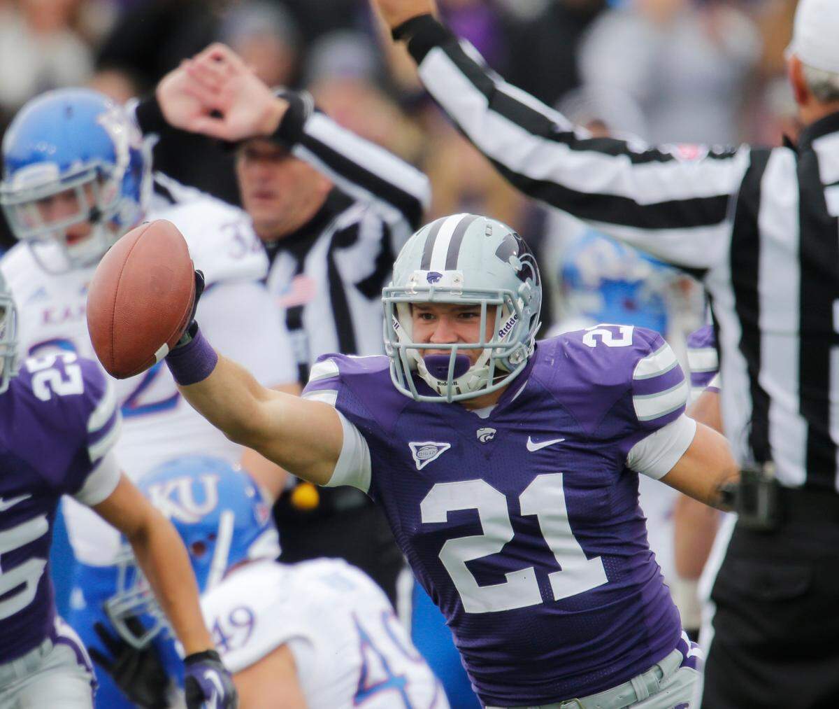 Kansas State Wildcats linebacker Jonathan Truman (21) celebrates after recovering a KU fumble in the 3rd quarter Saturday. Kansas turned over the ball 5 times.(Oct 06, 2012)