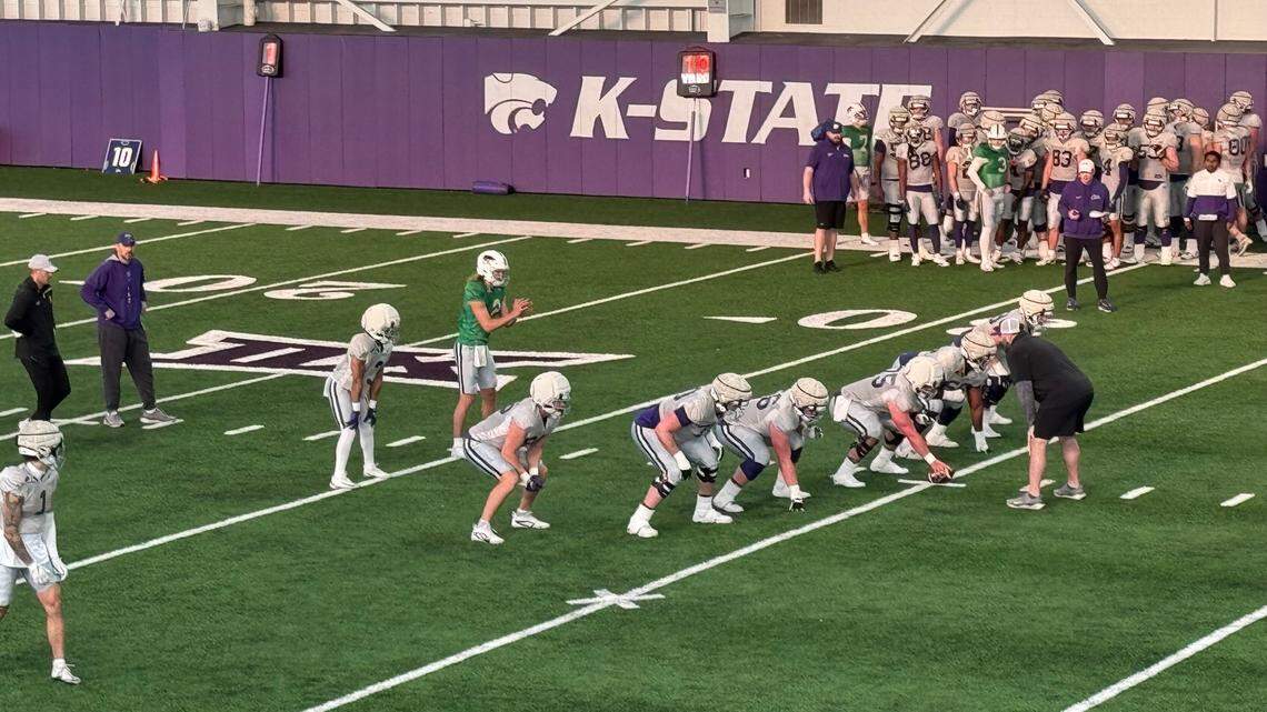 Kansas State quarterback Avery Johnson leads the offense during a 2025 spring practice in Manhattan.