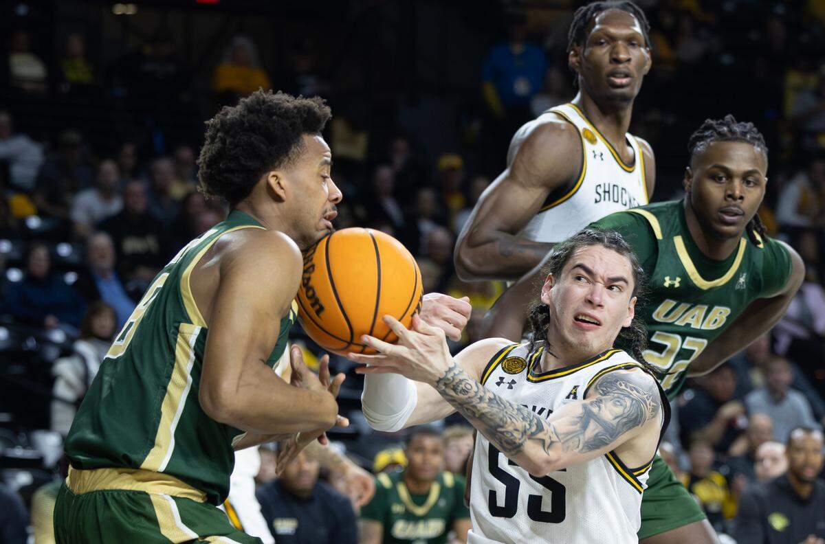 Wichita State’s Bijan Cortes has the ball stolen from him by UAB’s Efrem “Butta” Johnson during the first half on Thursday night at Koch Arena.