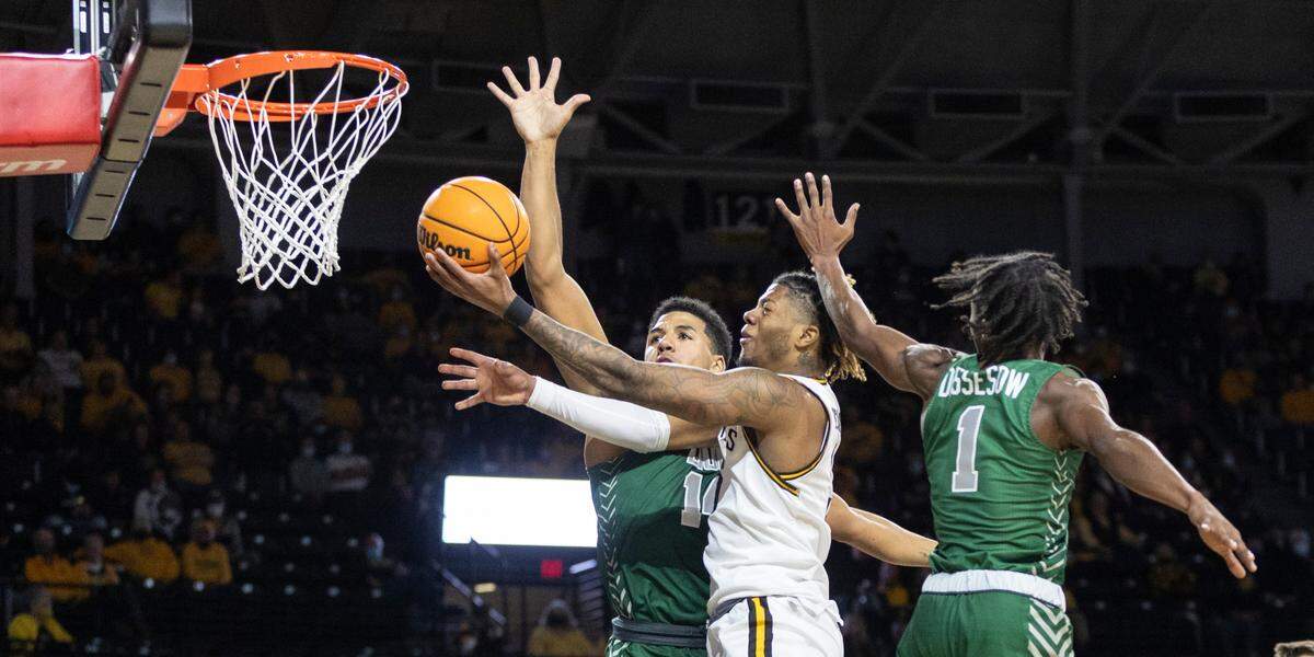 Wichita State’s Clarence Jackson foes to the basket against Missouri Southern’s Christian Bundy during the first half of their exhibition game at Koch Arena on Monday night.