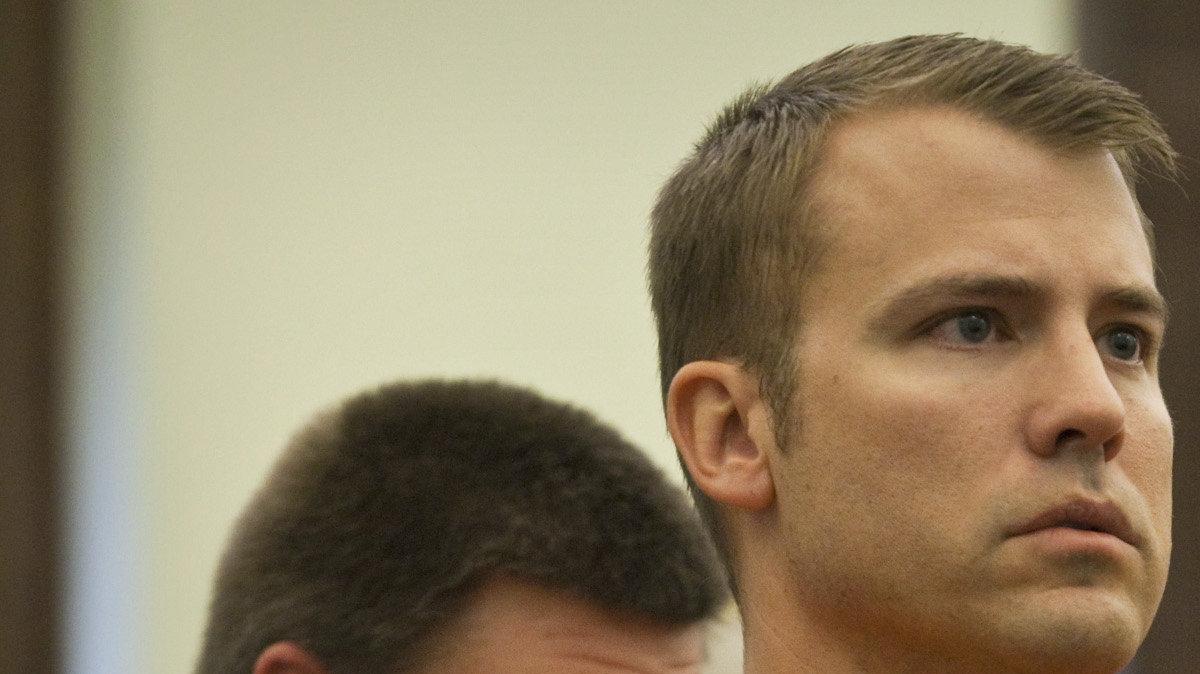 Brett Seacat, a 35-year-old law enforcement instructor charged with first-degree murder in the death of his wife, Vashti Seacat, is escorted from his first appearance in Kingman County District Court on Monday, May 16, 2011.