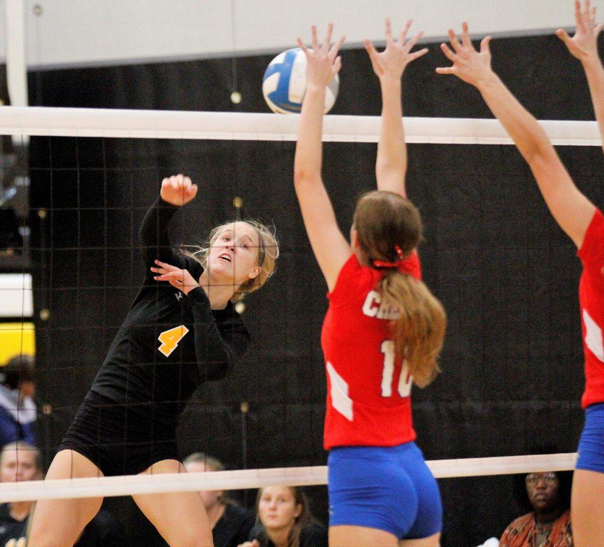 Garden Plain junior hitter Natasha Dooley goes for a kill against Cheney. (Sept. 13, 2018)