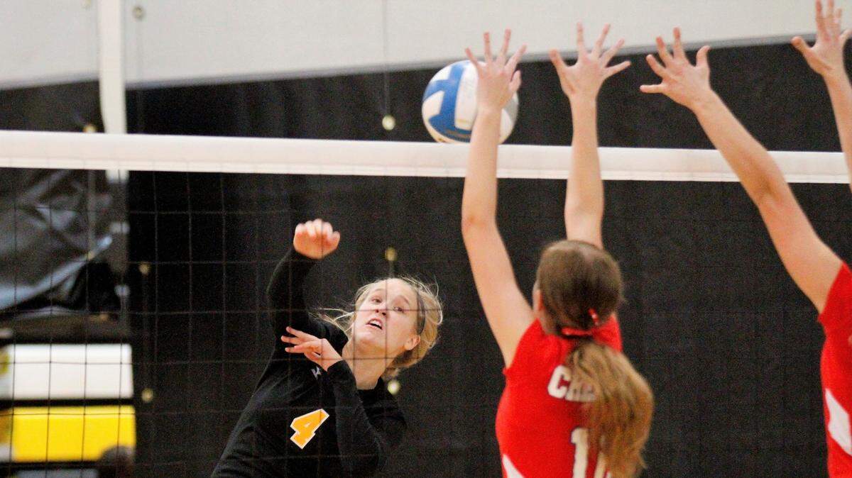 Garden Plain junior hitter Natasha Dooley goes for a kill against Cheney. (Sept. 13, 2018)