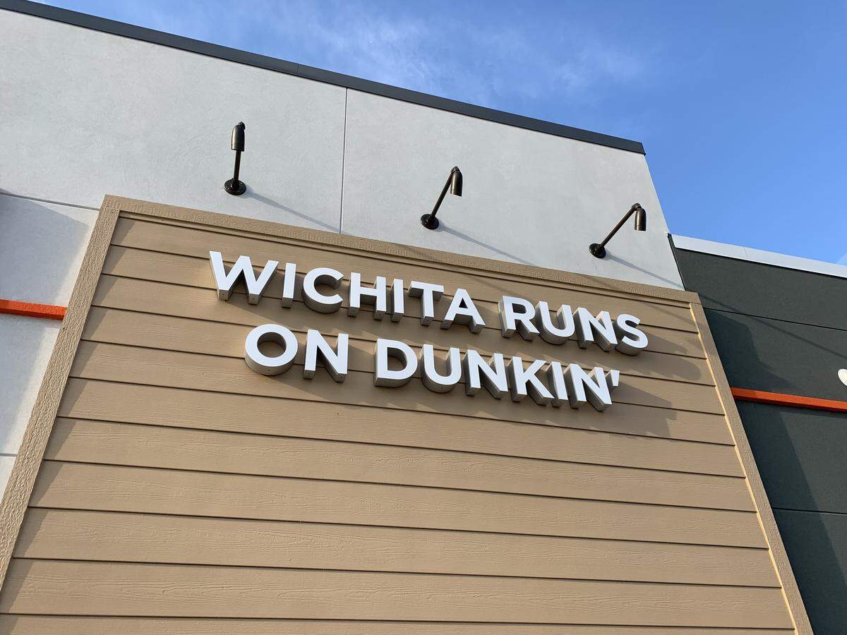 A bold statement, hung on the side of Wichita’s newest Dunkin’.