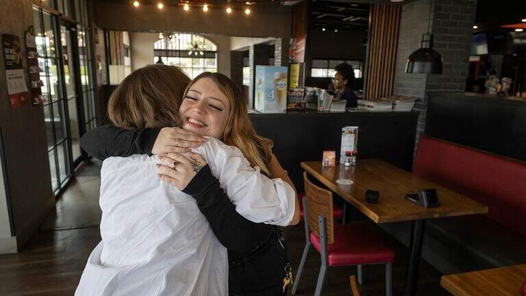 For some Wichita restaurant workers, the path to the American Dream includes a coach