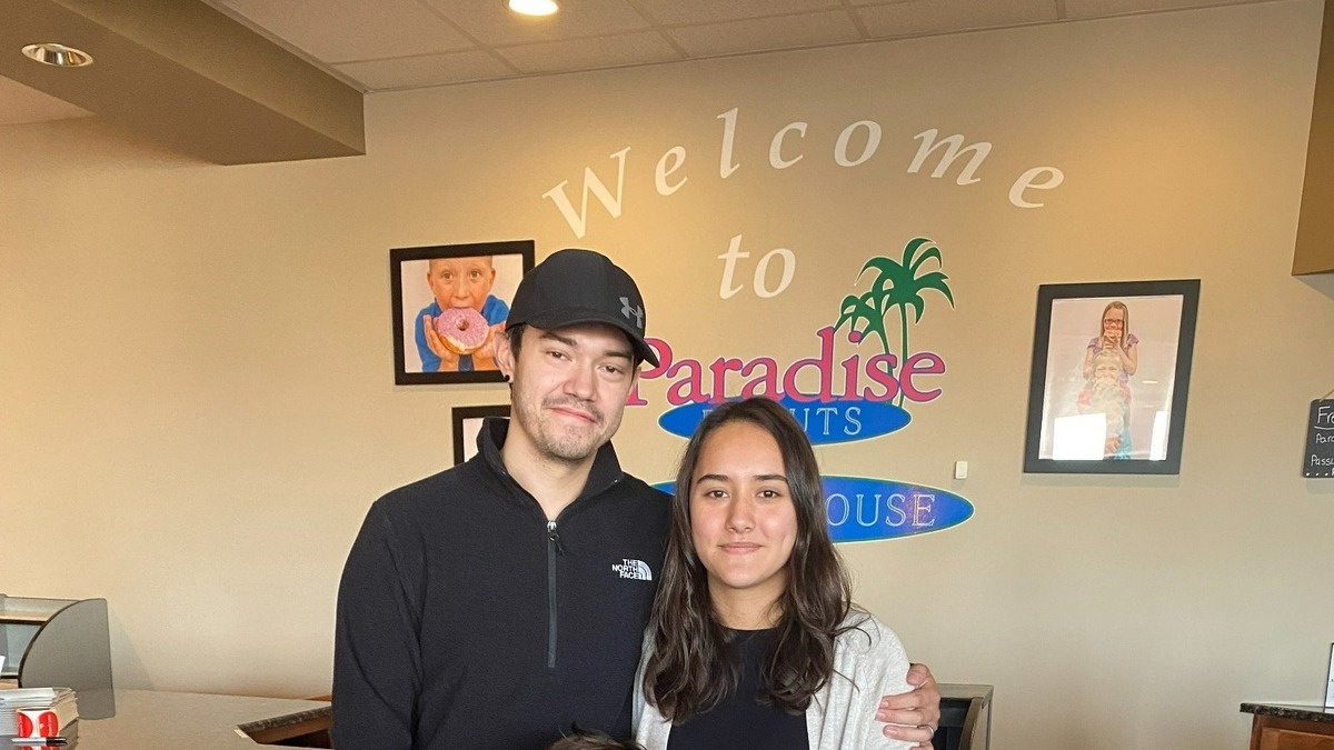 John and Melina Abney, pictured with their 5-year-old son Grayson, are the new owners of Paradise Donuts in Wichita. They both previously worked as employees for previous owners Marilyn and Hervey Wright.