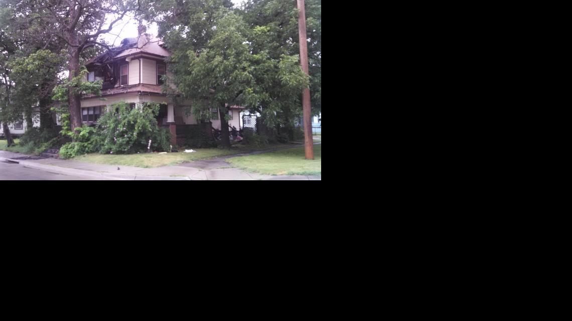 This house in the 800 block was one of two on South Seneca that caught fire 12 minutes apart early Thursday morning, authorities said. (July 10, 2014)

