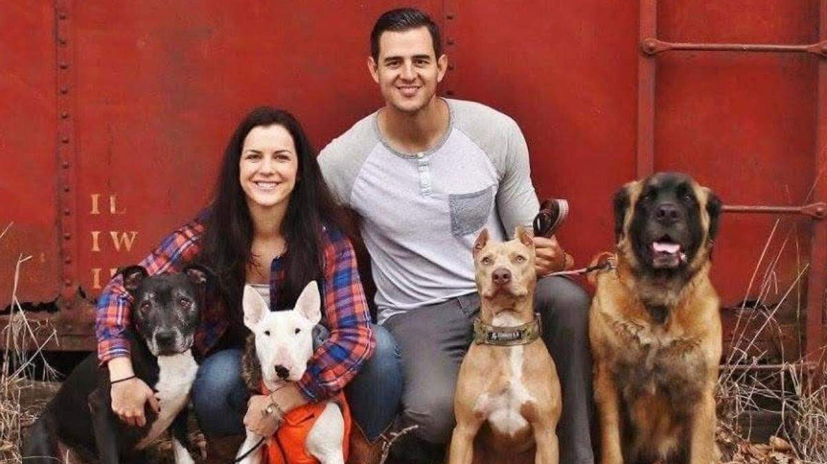 As a 16-year-old, Paige Fawcett worked for a veterinarian who put people and their pets first. Now, she’s purchased a veterinarian clinic with the same ideals. She’s shown with her husband, Daniel Gonzalez, and, from left, dogs Dozer, Gator, Kash and McGuire.