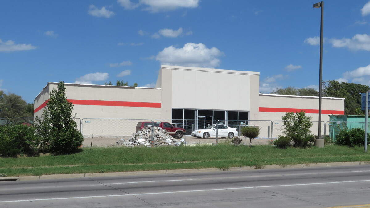 The former Boys & Girls Club building at 21st and Grove is being rebuilt into a Family Dollar store. Neighbors are fuming because they say their area is already saturated with discount dollar stores and they need a full-service supermarket.