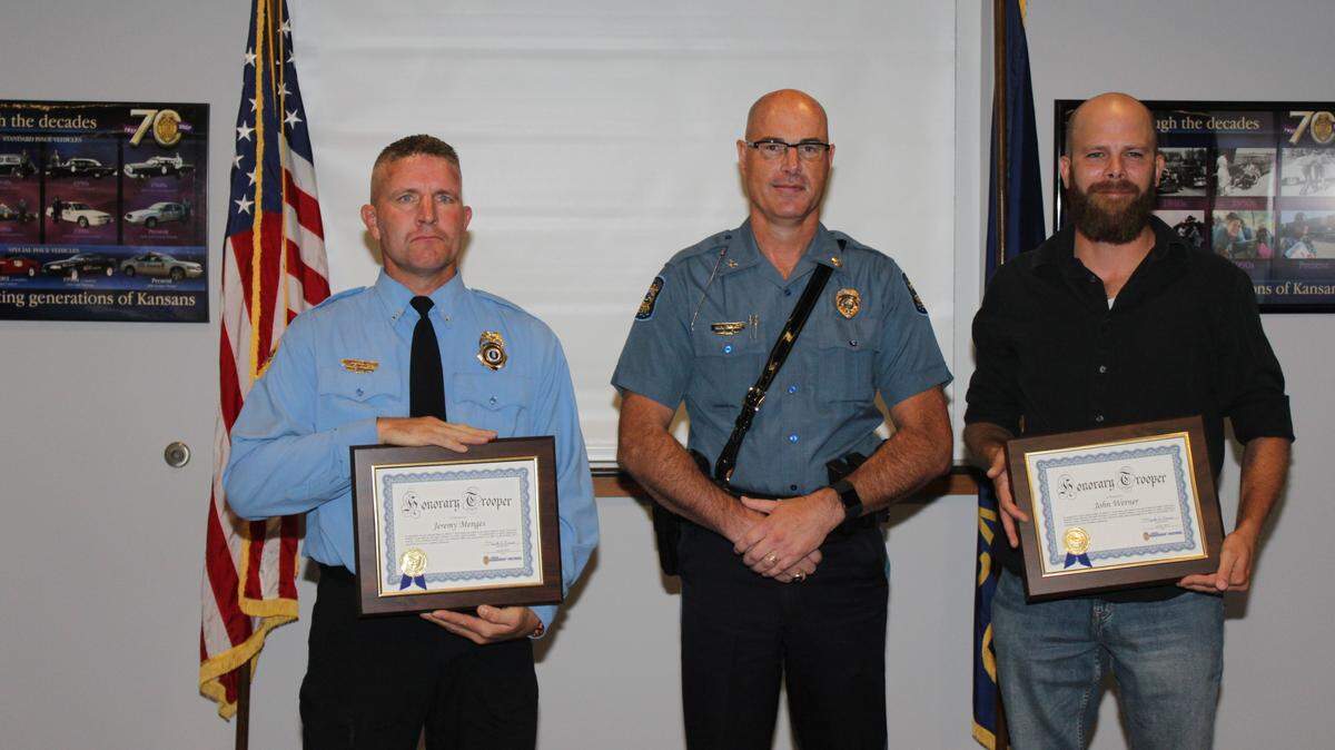 Jeremy Menges, left, and John Werner, right, were named honorary troopers by the Kansas Highway Patrol.
