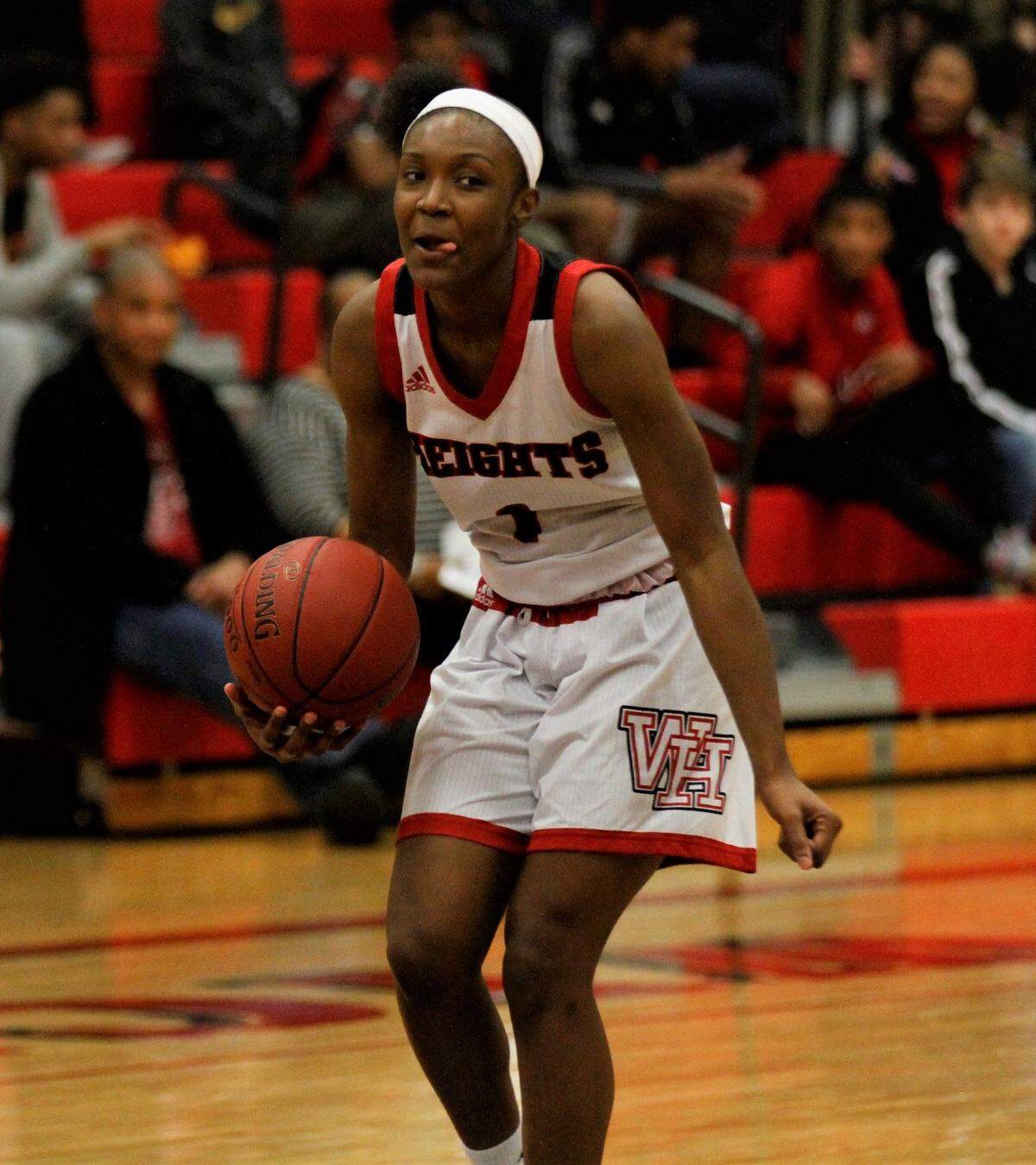 Wichita Heights’ Laniah Randle and the Falcons clinched the City League girls basketball title Friday with a home win over Wichita South.
