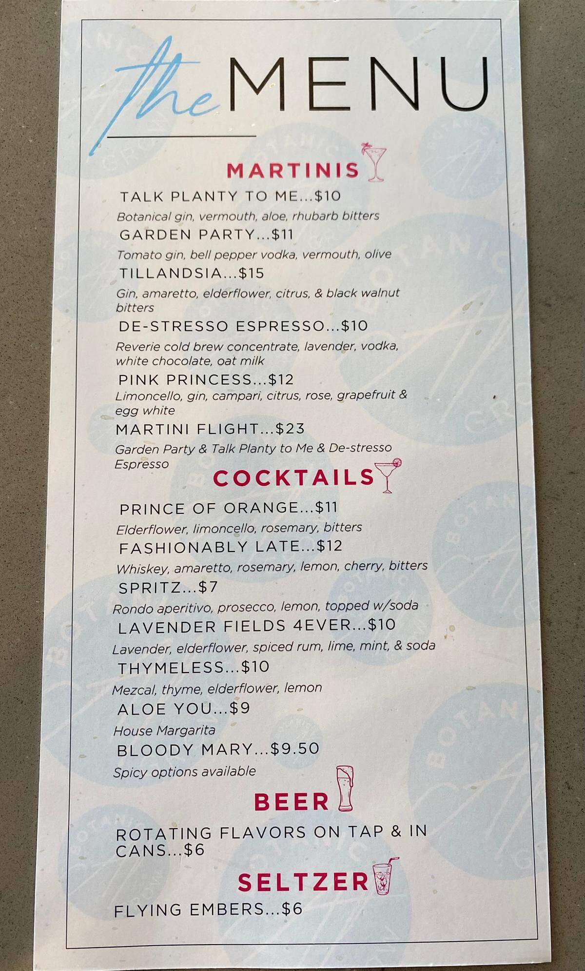 The martini and cocktail menu at Botanic, the bar inside GROW at Market and Waterman.
