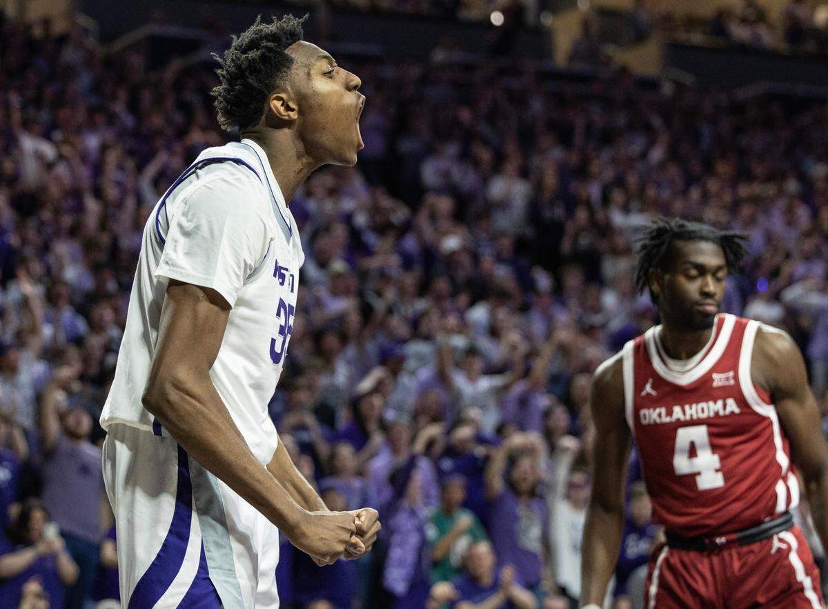 Kansas State’s Nae’Qwan Tomlin lets outs a yell after a dunk against Oklahoma during the second half on Wednesday night in Manhattan.