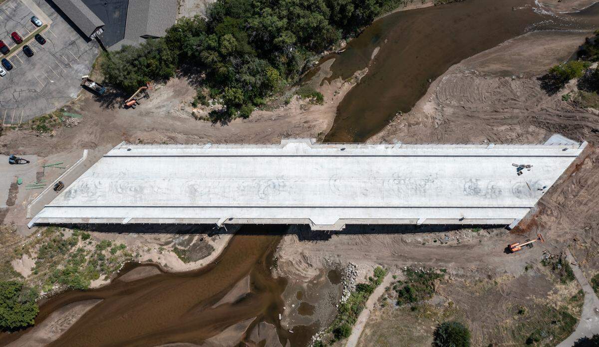 The newly constructed Amidon Street bridge over the Arkansas River is getting closer to completion and should be open around Thanksgiving.