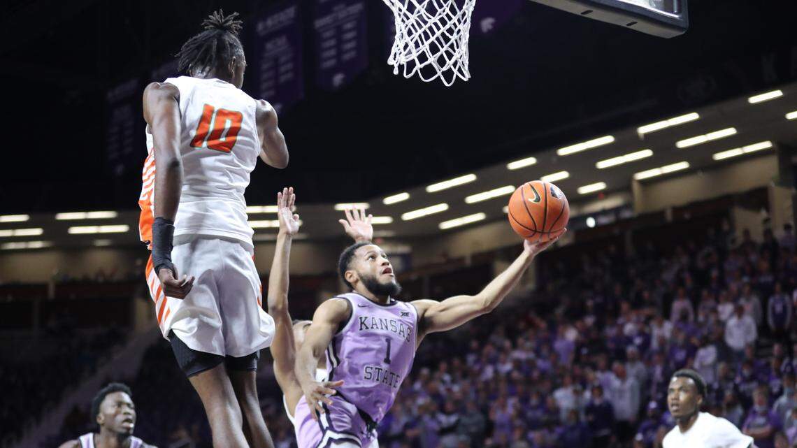 Kansas State guard Markquis Nowell goes up for a layup against Florida A&M guard Chase Barrs at Bramlage Coliseum.