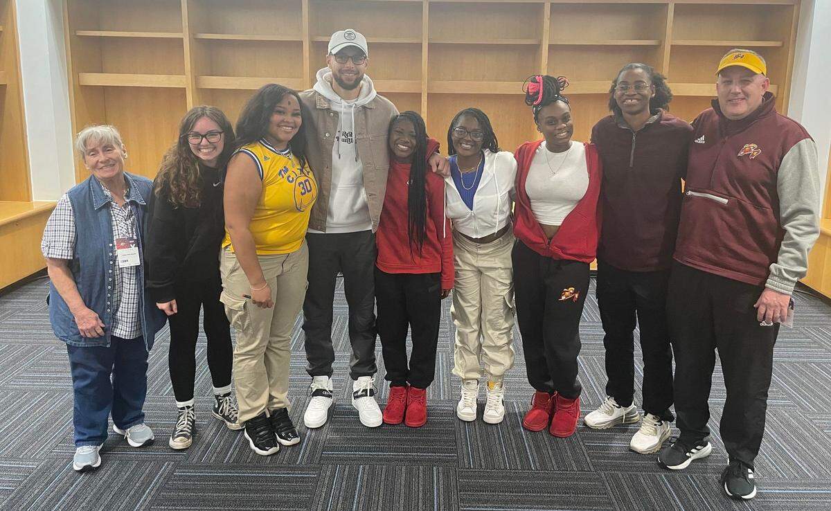 NBA superstar Steph Curry of the Golden State Warriors signed autographs and took pictures with members of the West girls basketball team after their game in Oklahoma City on Tuesday.