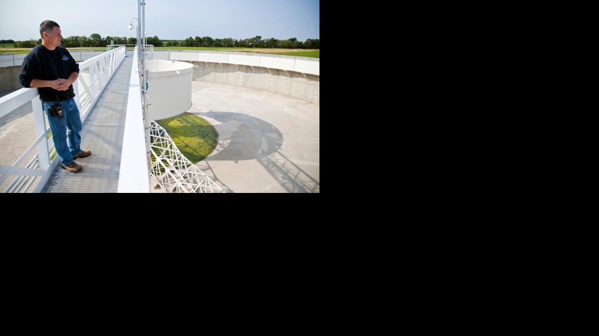 Electronics technician Tony Koehn looks over the empty pre-sedimentation basin at the Equus Beds Aquifer Storage and Recovery Project. (Aug. 17, 2012)

