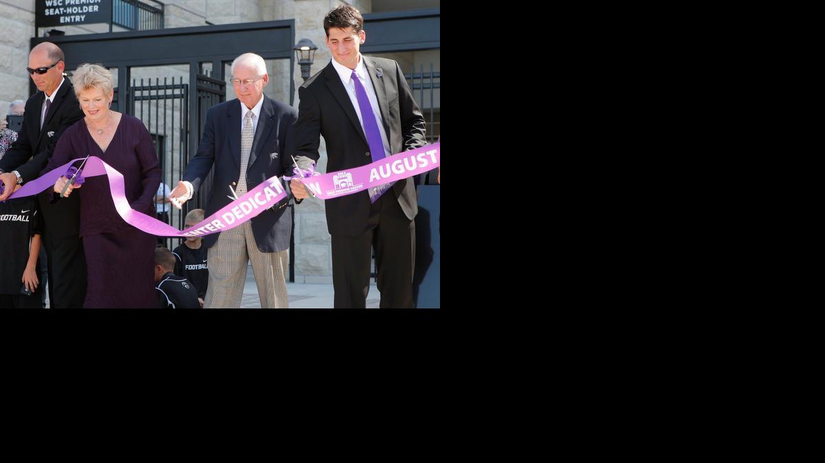 From left Sean Snyder, Sharon Snyder, coach Bill Snyder and K-State basketball player Brian Rohleder cut the ribbon officially dedicating the West Stadium Center at Snyder Family Stadium in 2013. K-State is about to embark on its next construction project at the Wildcats’ football stadium.

