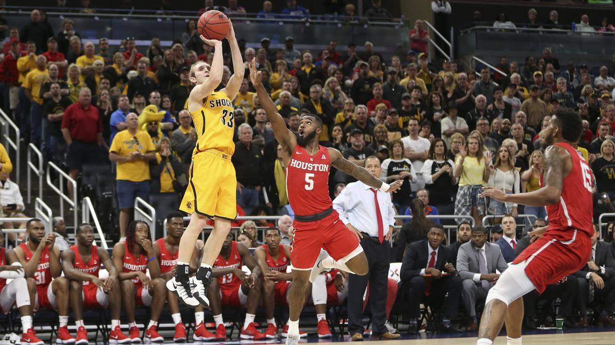 Wichita State guard Conner Frankamp shoots over Houston guard Corey Davis Jr. during the first half of their AAC Tournament semifinal game on Saturday in Orlando.