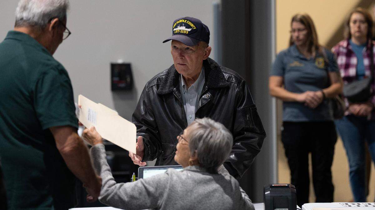 Early morning voters traveled through a thick morning fog to vote at Life.Church West Wichita around 7 a.m.