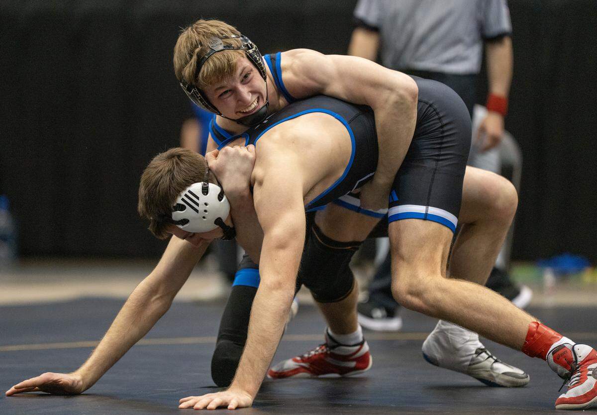 Goddard’s Kolton McElwain defeated Kapaun’s Eli Koster in the 157-pound division of the 5A State Wrestling Championship at the Heartland Credit Union Arena. It is McElwain’s second state title.