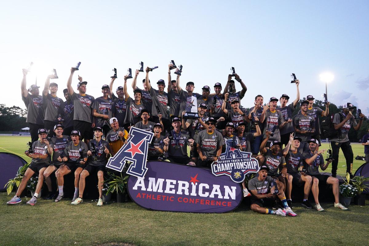The Wichita State men’s track and field team celebrates its stunning victory over Houston at the American Athletic Conference Outdoor Championships in Tampa on Sunday.