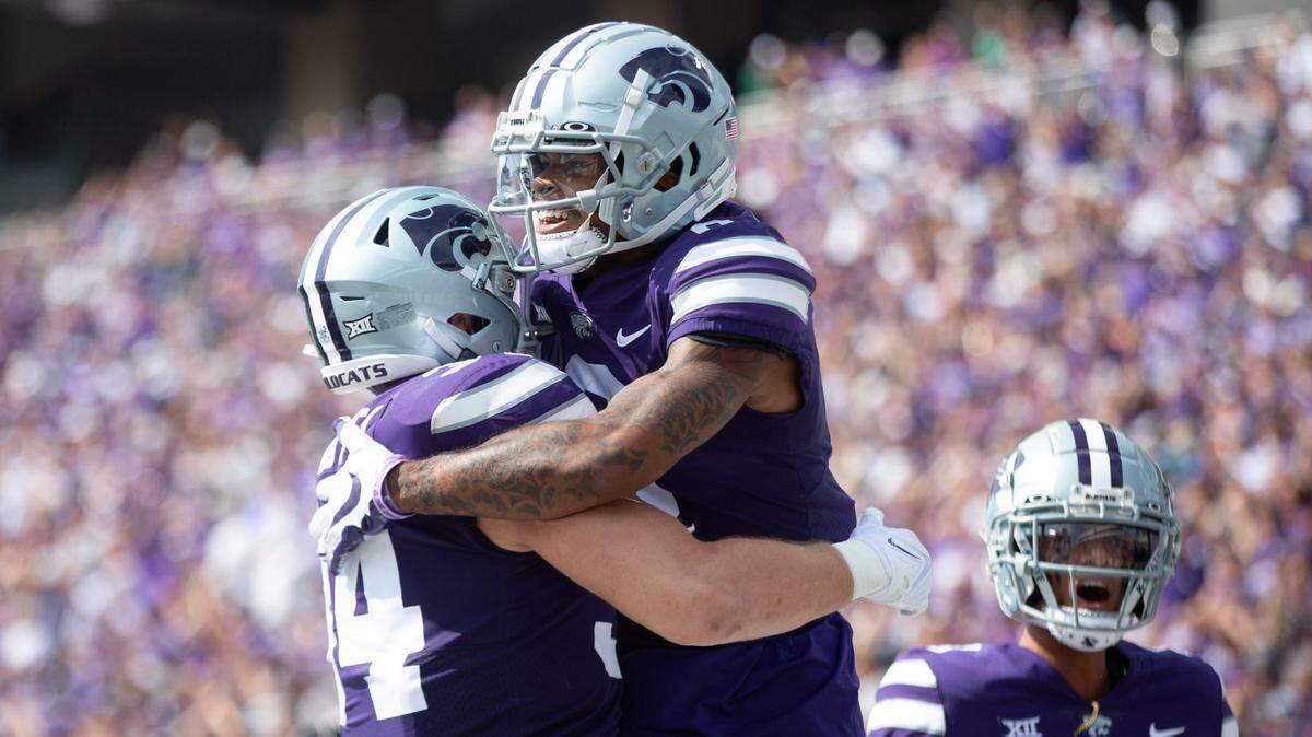 Kansas State senior wide receiver Jadon Jackson (0) reacts with teammates after scoring a touchdown early in the first quarter against Troy during Saturday’s game inside Bill Snyder Family Stadium on Sept. 9, 2023.