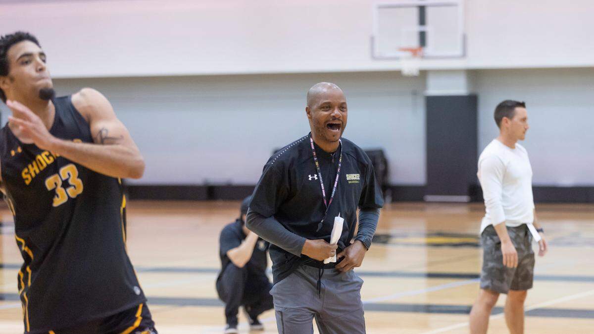 Wichita State coach Isaac Brown yells instructions in the first practice of the season at Koch Arena on Tuesday. Brown is trying to acclimate 12 newcomers to the team this season.