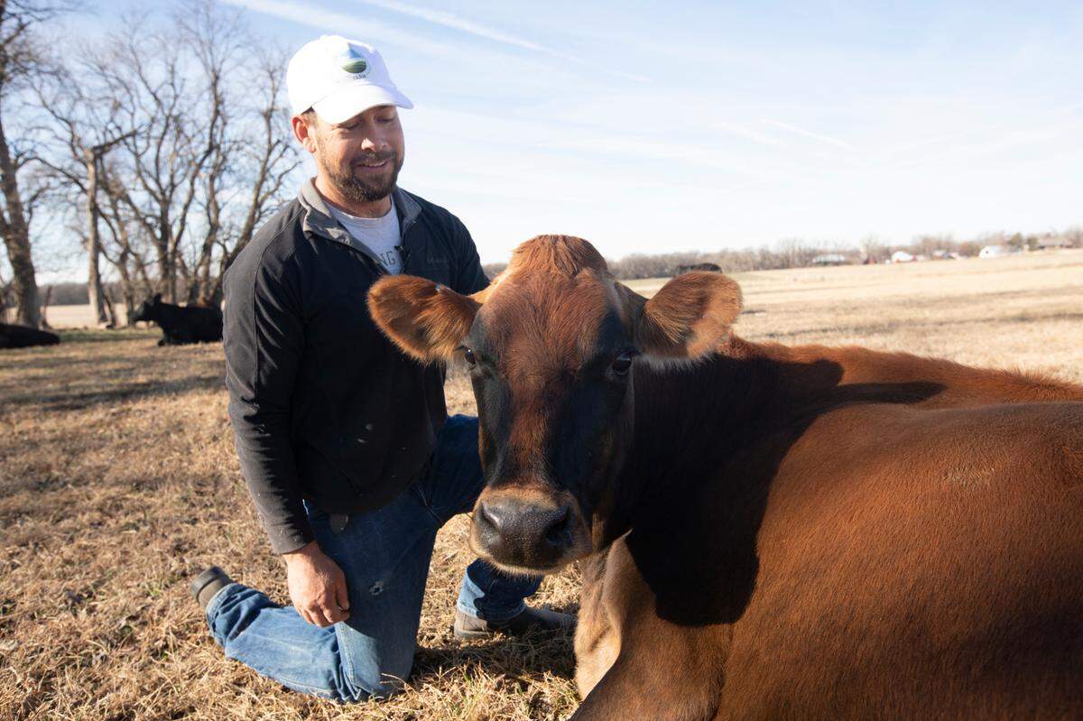 Jason Schmidt, owner of Grazing Plains Farm, a small dairy operation in south-central Kansas, and board member of the Kansas Farmers Union, is one of many Kansas farmers and ranchers who practice conservation. Schmidt, seen on Dec. 10, 2020, is a fifth-generation Kansas farmer.