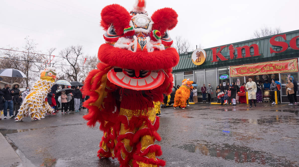 A photo of the St. Anthony Lion Dance team performing last year at the Kimson Asian Market, 960 E Pawnee.
